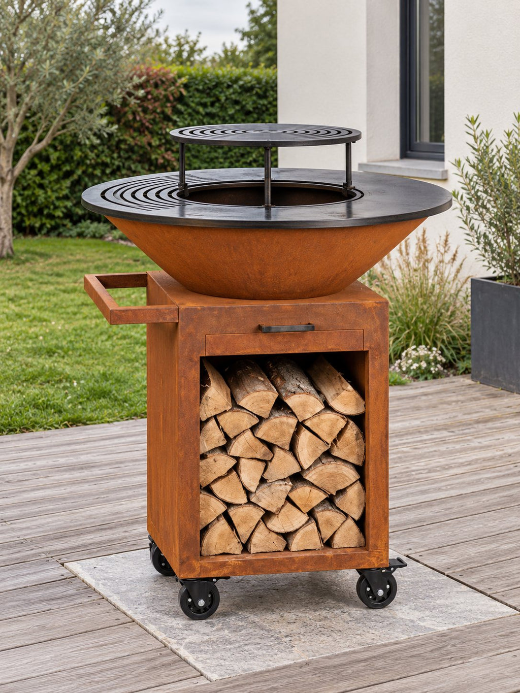 Brasero plancha Cabestan sur une terrasse au jardin