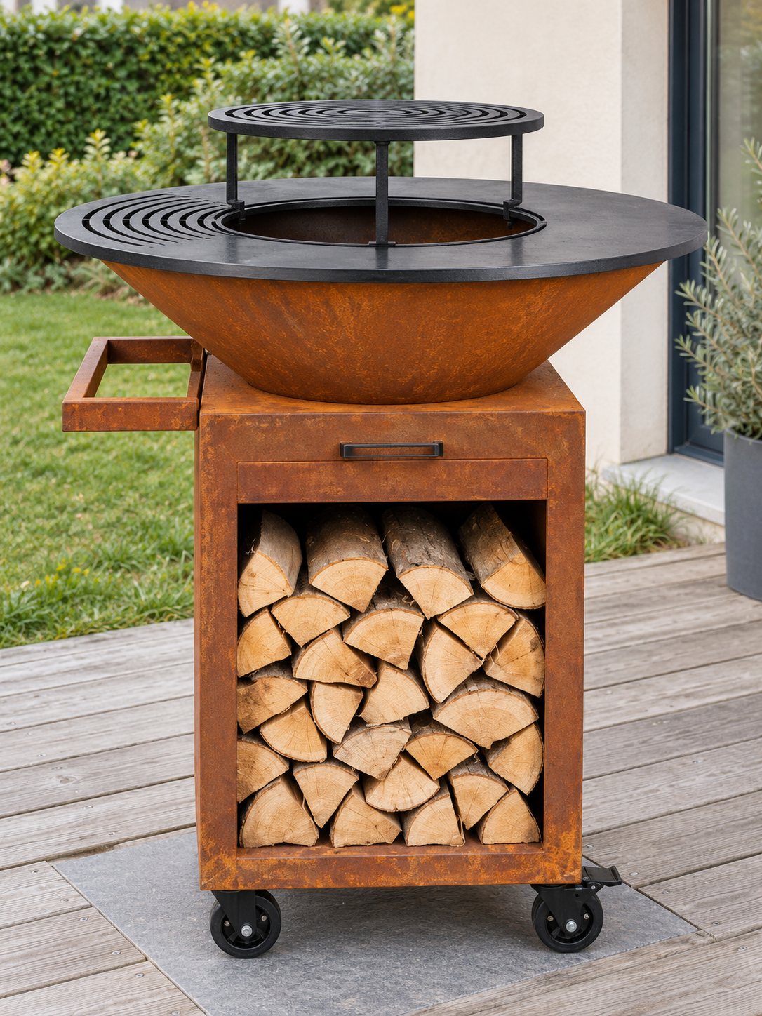 Plancha et grille surélevée du brasero Cabestan en cuisson